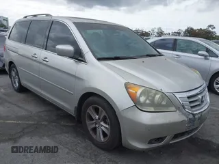 2008 Honda Odyssey Touring with VIN 5FNRL38908B058867, listed as a IAAI auction lot 42126471 with 201,088 mi miles and . Bid and sale history available at DreamBid. Image 1.