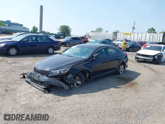 2015 Kia Optima LX with VIN KNAGM4A7XF5653580, listed as a IAAI auction lot 42483072 with 103,589 mi miles and . Bid and sale history available at DreamBid. Image 2.