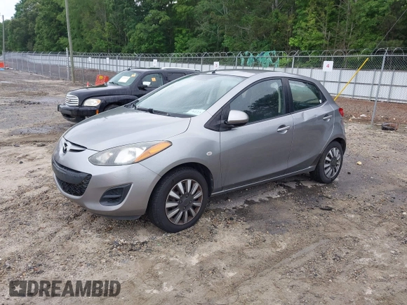 2013 Mazda 2 Sport with VIN JM1DE1KY9D0170519, listed as a IAAI auction lot 42212054 with 182,643 mi miles and . Bid and sale history available at DreamBid. Image 2.