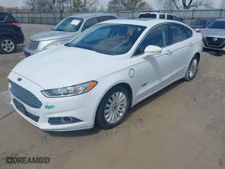 2015 Ford Fusion Energi SE Luxury with VIN 3FA6P0PU6FR128725, listed as a IAAI auction lot 41942887 with 138,731 mi miles. Bid and sale history available at carsss.com. Image 2.