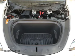 2023 Tesla Model Y Long Range z VIN 7SAYGDEE8PA069248, wystawiony jako Copart lot #74120944 z przebiegiem 17 085 mil mil oraz Szkoda całkowita • Salvage title. Historia ofert i sprzedaży dostępna na DreamBid. Obrazek 11.