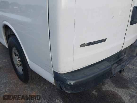 2013 Chevrolet Express Cargo with VIN 1GCWGFCG2D1144523, listed as a IAAI auction lot 41729515 with 282,755 mi miles and . Bid and sale history available at DreamBid. Image 6.
