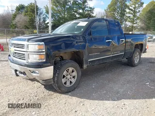 2014 Chevrolet Silverado 1500 LTZ with VIN 1GCVKSEC1EZ105678, listed as a IAAI auction lot 41299817 with 142,014 mi miles and . Bid and sale history available at DreamBid. Image 2.