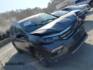 2016 Honda Pilot Elite with VIN 5FNYF6H01GB050555, listed as a IAAI auction lot 41670197 with 140,000 mi miles. Bid and sale history available at carsss.com. Image 13.