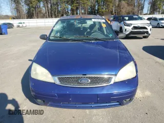 2005 Ford Focus SE with VIN 1FAHP36N05W134830, listed as a Copart auction lot 41696485 with 250,582 mi miles and Salvage Title. Bid and sale history available at carsss.com. Image 5.