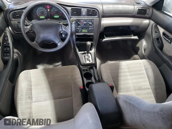 2002 Subaru Legacy L with VIN 4S3BH635027303575, listed as a Copart auction lot 79429344 with 200,770 mi miles and Salvage title. Bid and sale history available at DreamBid. Image 8.