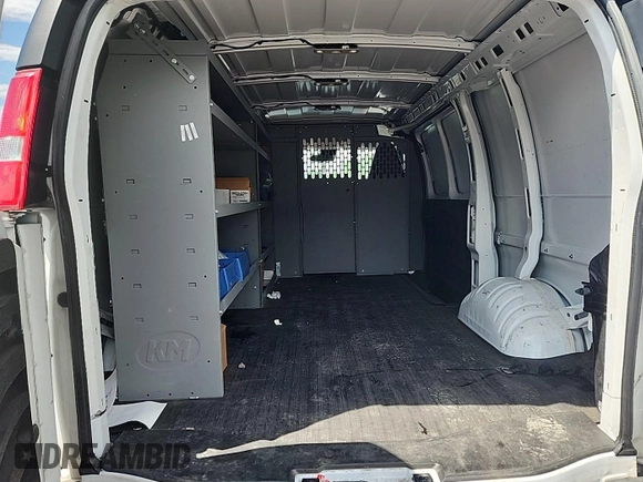 2021 Chevrolet Express Cargo with VIN 1GCWGAFP2M1303233, listed as a IAAI auction lot 42731173 with 57,034 mi miles and . Bid and sale history available at DreamBid. Image 5.
