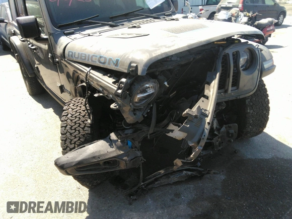 2022 Jeep Wrangler Unlimited Rubicon with VIN 1C4JJXR60NW182756, listed as a IAAI auction lot 36927414 with Not provided miles and . Bid and sale history available at DreamBid. Image 6.