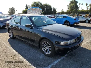 2003 BMW 5 Series 525i with VIN WBADT33433GF43797, listed as a Copart auction lot 70476904 with 194,319 mi miles and Salvage Title. Bid and sale history available at carsss.com. Image 4.