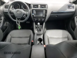 2017 Volkswagen Jetta SEL z VIN 3VWL17AJ6HM392174, wystawiony jako Copart lot #57771225 z przebiegiem 31 148 mil mil oraz Szkoda całkowita • Salvage title. Historia ofert i sprzedaży dostępna na DreamBid. Obrazek 8.