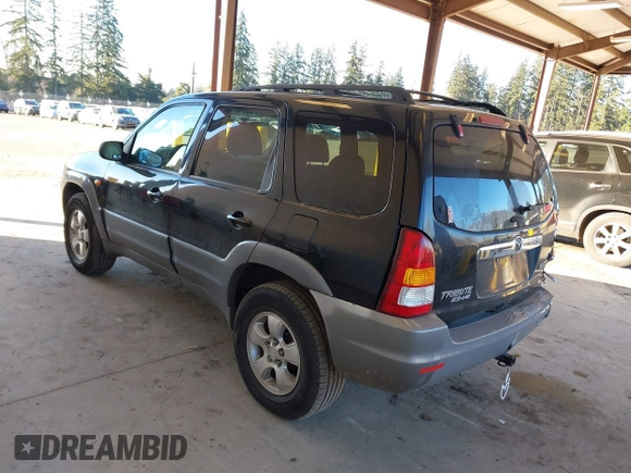 2002 Mazda Tribute LX with VIN 4F2CU08172KM58561, listed as a IAAI auction lot 41435407 with 141,908 mi miles and . Bid and sale history available at carsss.com. Image 3.