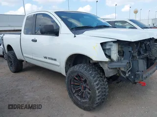 2013 Nissan Titan with VIN 1N6BA0CJ5DN310418, listed as a IAAI auction lot 42314918 with 206,795 mi miles and . Bid and sale history available at DreamBid. Image 1.