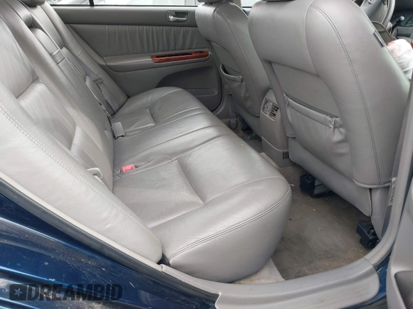 2004 Toyota Camry LE with VIN 4T1BF30K44U069441, listed as a IAAI auction lot 41740124 with 145,906 mi miles. Bid and sale history available at carsss.com. Image 8.