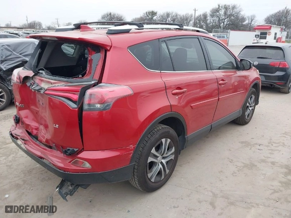 2016 Toyota RAV4 LE with VIN JTMZFREV4GJ063704, listed as a IAAI auction lot 41497086 with 153,748 mi miles. Bid and sale history available at carsss.com. Image 4.