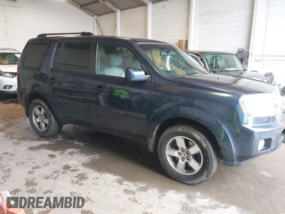2011 Honda Pilot EX-L with VIN 5FNYF4H66BB020176, listed as a IAAI auction lot 41973659 with 238,745 mi miles and . Bid and sale history available at carsss.com. Image 1.