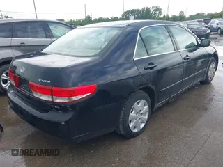 2003 Honda Accord LX with VIN 1HGCM563X3A005819, listed as a IAAI auction lot 42521193 with 105,903 mi miles and . Bid and sale history available at DreamBid. Image 4.