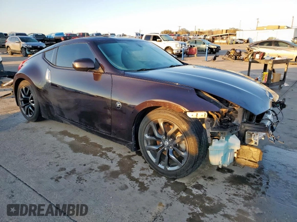2015 Nissan 370Z with VIN JN1AZ4EH1FM442502, listed as a Copart auction lot 48332035 with 101,462 mi miles and Salvage Title. Bid and sale history available at carsss.com. Image 4.
