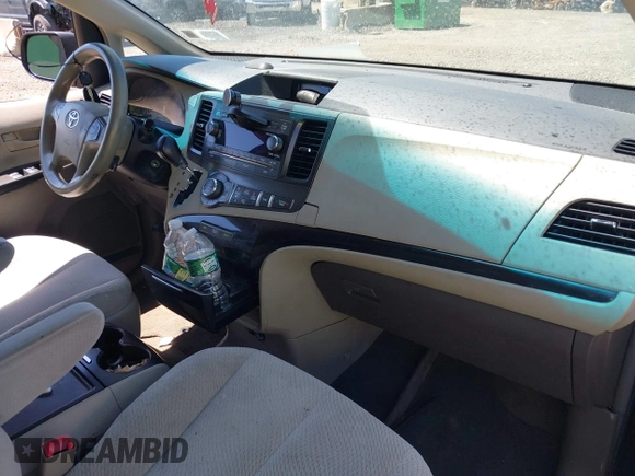 2014 Toyota Sienna LE AAS with VIN 5TDKK3DC6ES453200, listed as a IAAI auction lot 42277928 with 347,887 mi miles and . Bid and sale history available at DreamBid. Image 5.