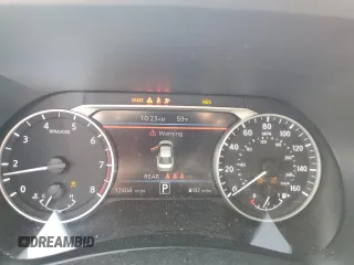 2023 Nissan Sentra SV z VIN 3N1AB8CV8PY310579, wystawiony jako Copart lot #52317515 z przebiegiem 12 404 mil mil oraz Szkoda całkowita • Salvage title. Historia ofert i sprzedaży dostępna na DreamBid. Obrazek 9.
