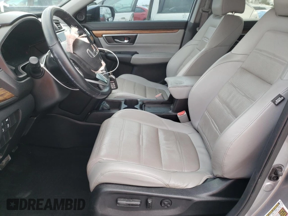 2018 Honda CR-V Touring with VIN 7FARW1H93JE055337, listed as a Copart auction lot 45045305 with 74,776 mi miles and Salvage Title. Bid and sale history available at DreamBid. Image 7.