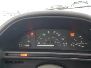 1990 Ford Tempo z VIN 1FAPP36X4LK167346, wystawiony jako Copart lot #84089494 z przebiegiem 66 291 mil mil oraz Szkody całkowita. Historia ofert i sprzedaży dostępna na DreamBid. Obrazek 9.