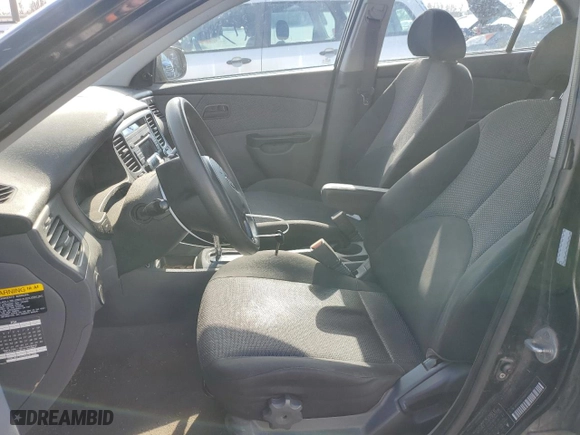 2010 Kia Rio LX with VIN KNADH4A3XA6673738, listed as a Copart auction lot 46979665 with 179,579 mi miles and Salvage Title. Bid and sale history available at carsss.com. Image 7.