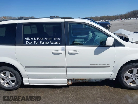 2010 Dodge Grand Caravan SXT with VIN 2D4RN5D14AR420265, listed as a IAAI auction lot 41970366 with 117,208 mi miles and . Bid and sale history available at DreamBid. Image 13.