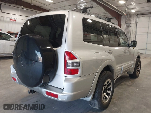 2002 Mitsubishi Montero Limited z VIN JA4MW51RX2J048087, wystawiony jako IAAI lot #42096678 z przebiegiem 218 795 mil mil oraz . Historia ofert i sprzedaży dostępna na DreamBid. Obrazek 4.