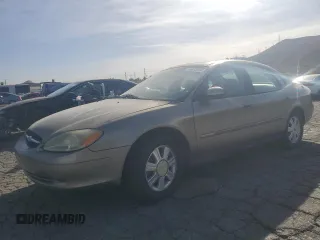 2003 Ford Taurus SEL Deluxe with VIN 1FAFP56S23G221922, listed as a Copart auction lot 79673294 with 142,911 mi miles and Salvage Title. Bid and sale history available at DreamBid. Image 1.