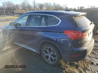 2018 BMW X1 xDrive28i with VIN WBXHT3C32J3H31391, listed as a Copart auction lot 88584855 with 32,441 mi miles and Salvage Title. Bid and sale history available at DreamBid. Image 2.