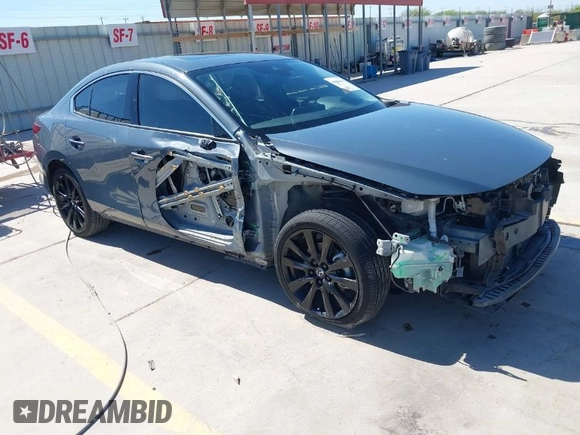 2022 Mazda 3 2.5 Turbo z VIN 3MZBPBAY8NM308426, wystawiony jako IAAI lot #41808563 z przebiegiem 44 693 mil mil oraz . Historia ofert i sprzedaży dostępna na DreamBid. Obrazek 1.