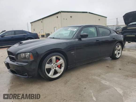 2008 Dodge Charger SRT-8 with VIN 2B3KA73W18H154739, listed as a Copart auction lot 44809055 with 205,634 mi miles and Salvage Title. Bid and sale history available at DreamBid. Image 1.