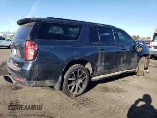 2021 Chevrolet Suburban RST z VIN 1GNSKEKD8MR193782, wystawiony jako Copart lot #82821484 z przebiegiem 74 195 mil mil oraz Szkoda całkowita • Salvage title. Historia ofert i sprzedaży dostępna na DreamBid. Obrazek 3.