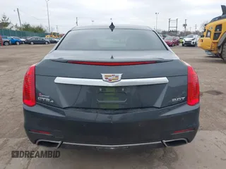 2015 Cadillac CTS AWD z VIN 1G6AW5SX6F0116891, wystawiony jako IAAI lot #42077259 z przebiegiem 119 426 mil mil oraz . Historia ofert i sprzedaży dostępna na DreamBid. Obrazek 16.