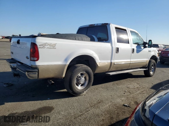2000 Ford Super Duty F-250 XL with VIN 1FTNW21S1YED65639, listed as a Copart auction lot 74377194 with 158,387 mi miles and Salvage Title. Bid and sale history available at carsss.com. Image 3.
