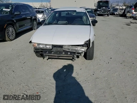 1996 Saturn SL with VIN 1G8ZK5279TZ162812, listed as a Copart auction lot 87079874 with 143,461 mi miles and Salvage title. Bid and sale history available at DreamBid. Image 11.
