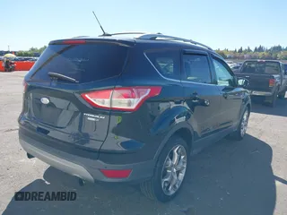 2013 Ford Escape Titanium с VIN 1FMCU9J90DUC27315, выставлен на аукционе IAAI как лот 42069018 с пробегом 129 223 миль миль и . История ставок и продаж доступна на DreamBid. Изображение 4.