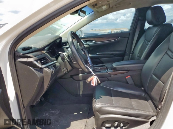 2018 Cadillac XTS Luxury with VIN 2G61M5S31J9124558, listed as a Copart auction lot 62873275 with 142,727 mi miles and Salvage title. Bid and sale history available at DreamBid. Image 7.