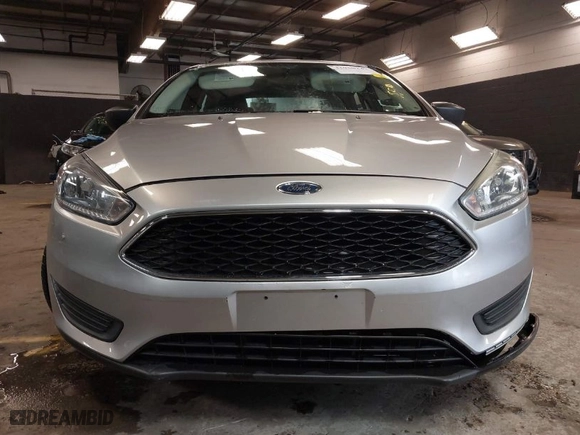 2016 Ford Focus S with VIN 1FADP3E22GL390039, listed as a IAAI auction lot 41958137 with 83,411 mi miles. Bid and sale history available at carsss.com. Image 12.
