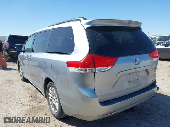 2011 Toyota Sienna XLE AAS with VIN 5TDYK3DCXBS172586, listed as a IAAI auction lot 41835992 with 203,599 mi miles. Bid and sale history available at carsss.com. Image 3.