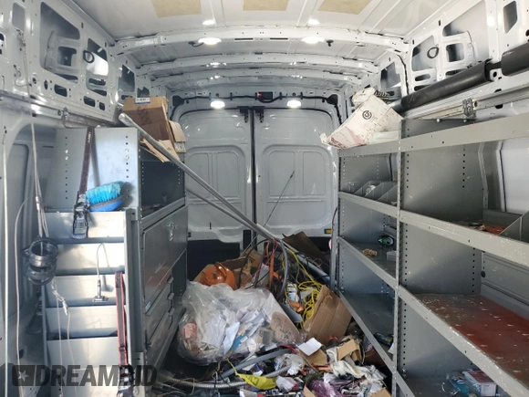 2023 Ford Transit Cargo with VIN 1FTBR3X88PKA74339, listed as a Copart auction lot 48634405 with 103,840 mi miles and Salvage title. Bid and sale history available at DreamBid. Image 10.