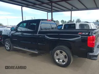 2014 Chevrolet Silverado 1500 LT with VIN 1GCVKREC5EZ325771, listed as a IAAI auction lot 41691858 with 123,475 mi miles and . Bid and sale history available at DreamBid. Image 15.