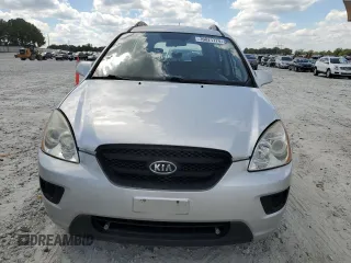 2009 Kia Rondo LX Base with VIN KNAFG528897229906, listed as a Copart auction lot 70821774 with 126,423 mi miles and Clean Title. Bid and sale history available at carsss.com. Image 5.