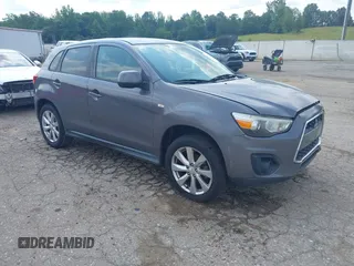 2015 Mitsubishi Outlander ES z VIN 4A4AP3AUXFE058267, wystawiony jako IAAI lot #42385188 z przebiegiem 168 881 mil mil oraz . Historia ofert i sprzedaży dostępna na DreamBid. Obrazek 1.