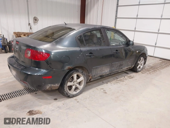 2004 Mazda 3 i with VIN JM1BK12F841139173, listed as a IAAI auction lot 40841392 with 264,821 mi miles and . Bid and sale history available at DreamBid. Image 4.