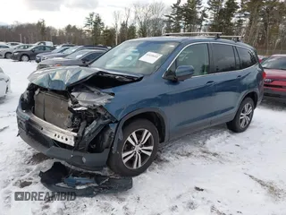 2018 Honda Pilot EX-L with VIN 5FNYF6H57JB007065, listed as a IAAI auction lot 41418432 with 123,806 mi miles. Bid and sale history available at carsss.com. Image 2.
