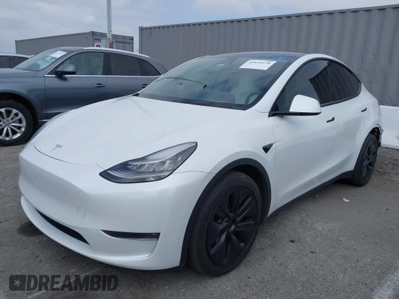 2021 Tesla Model Y Long Range with VIN 5YJYGDEE3MF081304, listed as a IAAI auction lot 42119270 with 90,521 mi miles. Bid and sale history available at carsss.com. Image 2.
