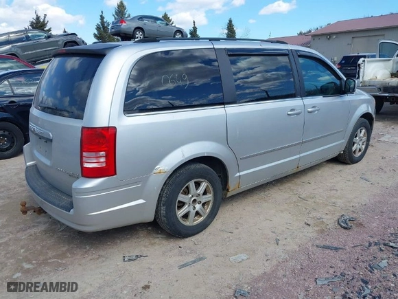 2010 Chrysler Town & Country Touring with VIN 2A4RR5D11AR308213, listed as a IAAI auction lot 41860649 with 196,072 mi miles. Bid and sale history available at carsss.com. Image 4.