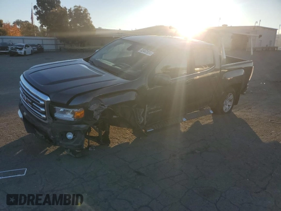 2017 GMC Canyon 2WD SLE with VIN 1GTG5CEN0H1300715, listed as a Copart auction lot 82447034 with 89,774 mi miles and Salvage Title. Bid and sale history available at carsss.com. Image 1.