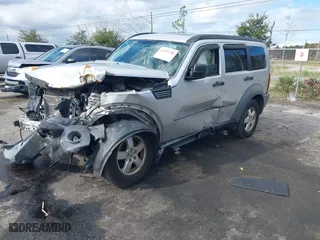 2007 Dodge Nitro SXT with VIN 1D8GT28K97W683073, listed as a IAAI auction lot 41123780 with 191,877 mi miles. Bid and sale history available at carsss.com. Image 16.